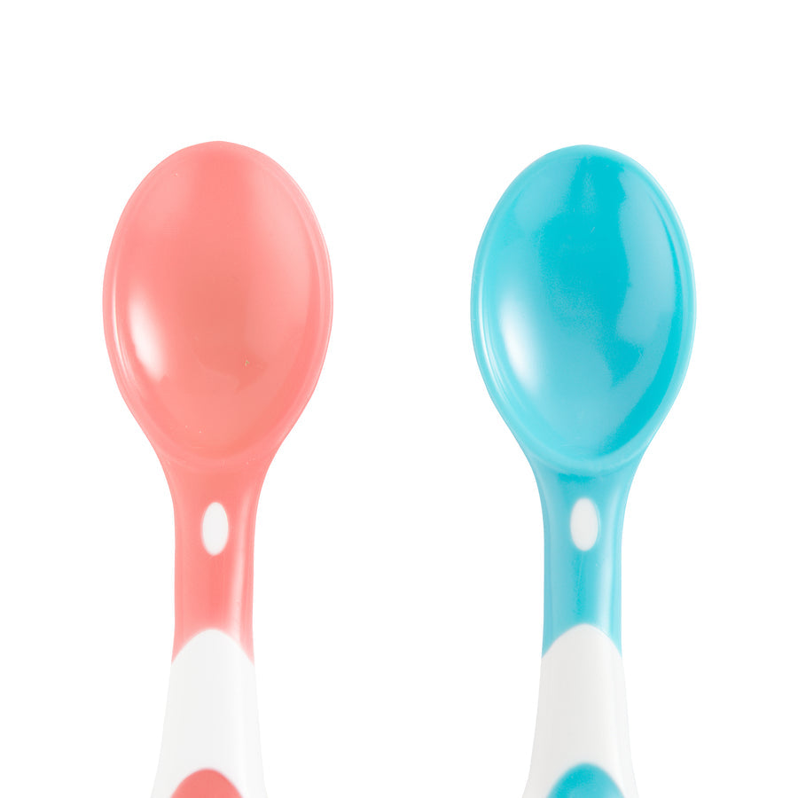 Two colorful baby spoons, one red and one blue, on a white background.