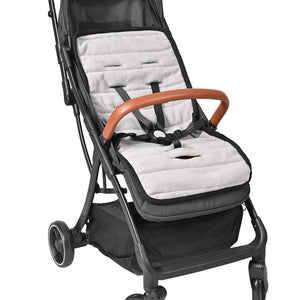Black stroller with a white cushion and brown handle on a white background