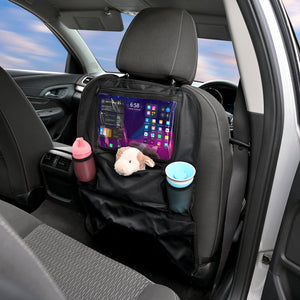 Car seat with a black cover displaying a tablet, sippy cup, and plush toy.