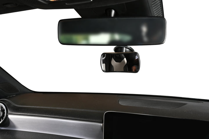 Car interior with a side mirror and rearview mirror on a white background